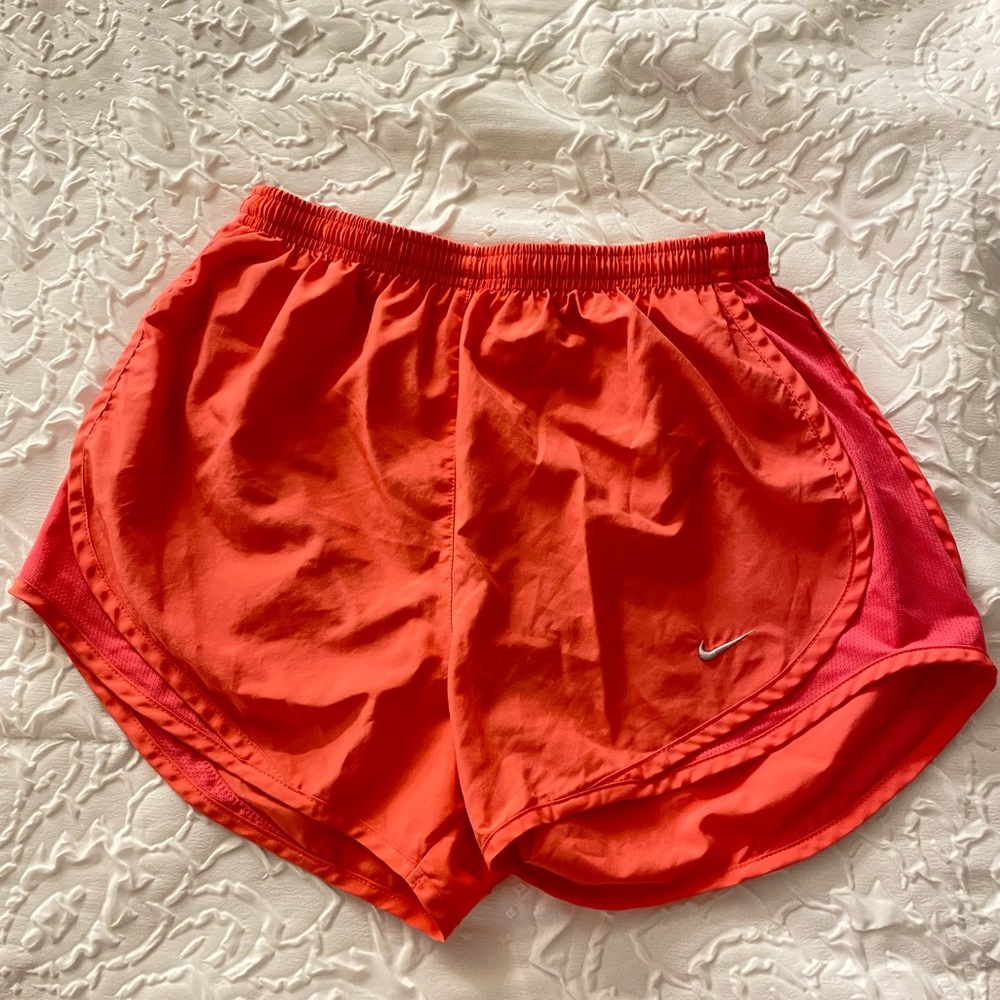 Coral Nike shorts